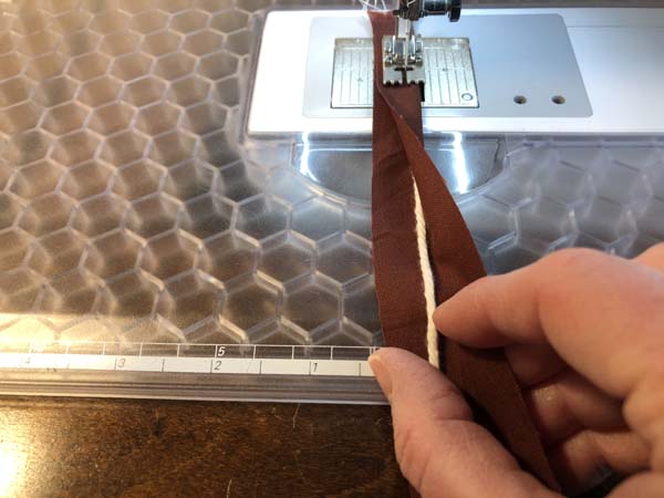 Piping with Pintuck foot 7 Showing piping with fabric