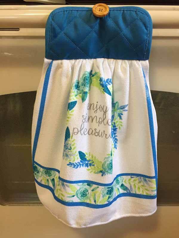 https://www.needlepointers.com/articleimages/Potholder-Dish-Towel-Finished-Hanging-On-Stove-Handle.jpg