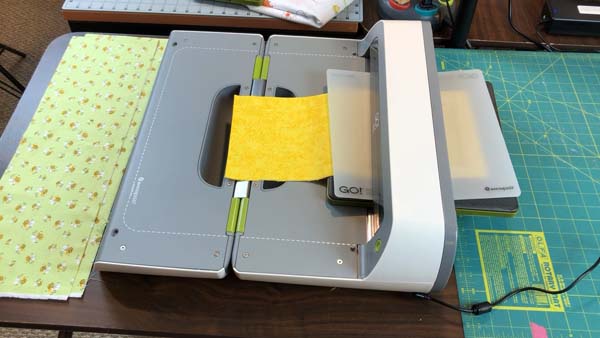 Propeller Block Cut Yellow Fabric with Accuquilt Go