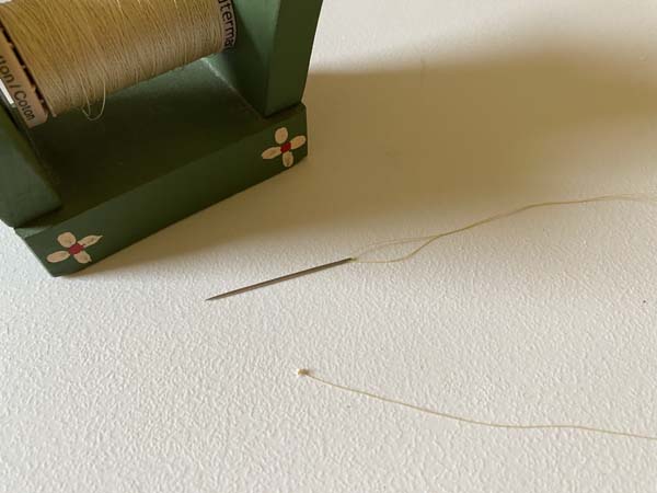 Quilters Knot Finished With Thread Holder