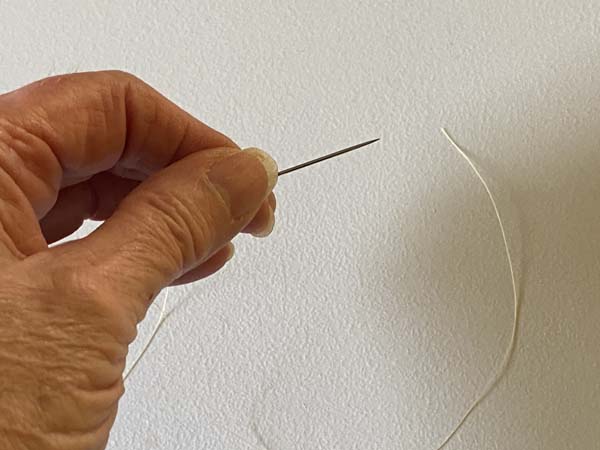 Quilters Knot Holding the Needle