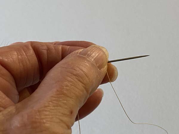 Quilters Knot Pinch Wrapped Thread