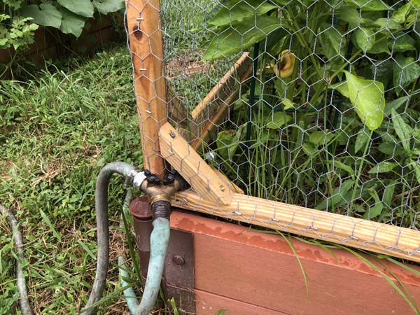 Raised Garden Bed Covers Hose Through Corner