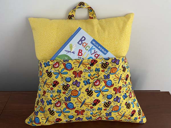 Reading Book Pocket Pillow Sample with Yellow Bugs Fabric