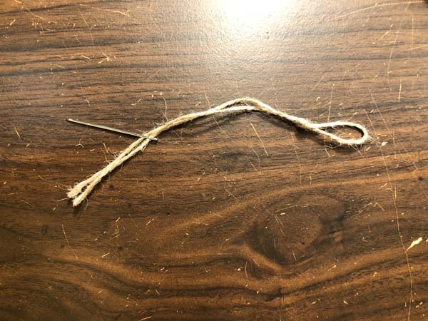 Santa yo yo ornament Threaded craft needle