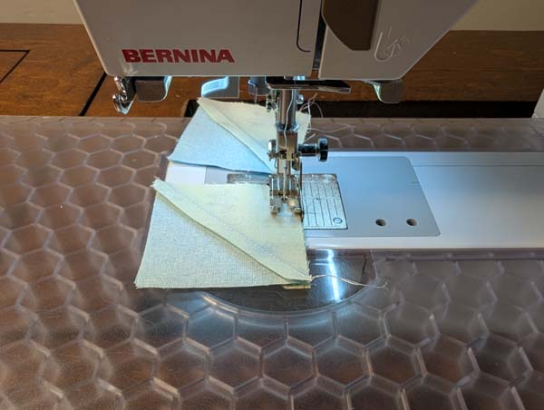 Sawtooth Star 22 Sew together half square triangles into v shape