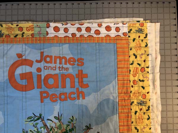 Scrappy Panel Quilt Showing Finished Quilting