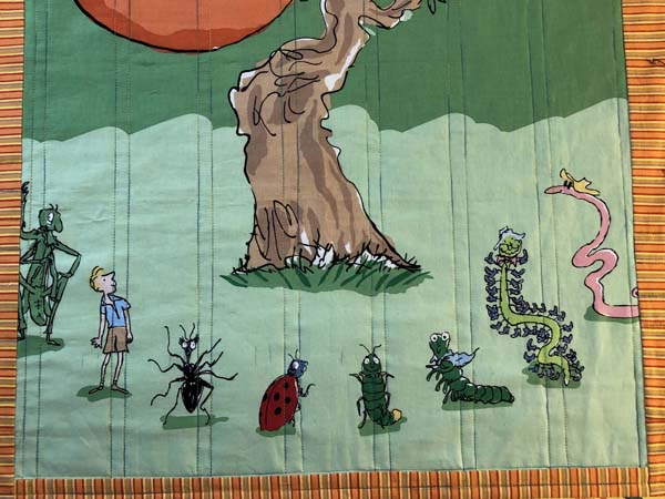 Scrappy Panel Quilt Showing Quilting In Center