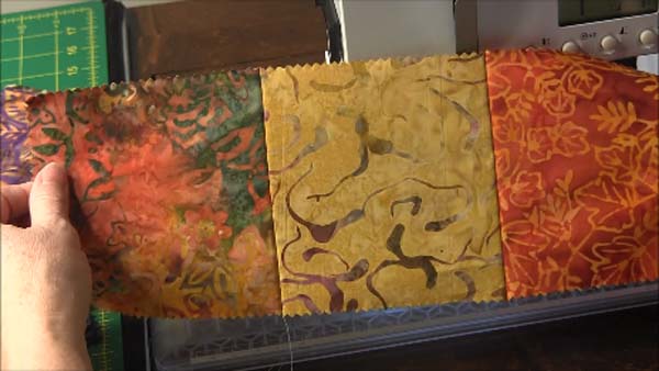 Scrappy Quilt Backing Quick Tip Row Finished