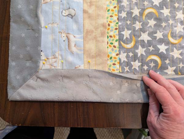 Self Bind Plush 14 pin binding overlapping quilt edge