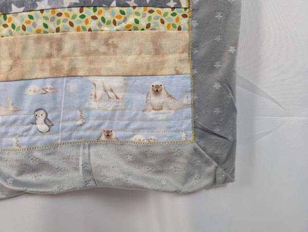 Strip Quilt with Minky Backing and self binding