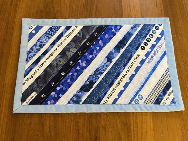 Selvage Mug Rug Finished on Table