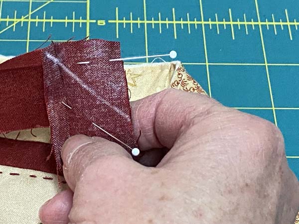 Single Fold Binding pin ends of binding together