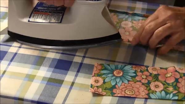 Sleeveless Doll Shirt_repeat fold and iron