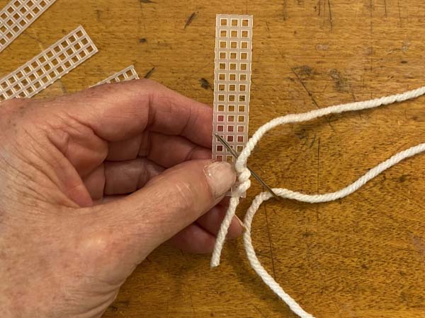 Snowflake Christmas Ornament Wrap and come up through each hole along side