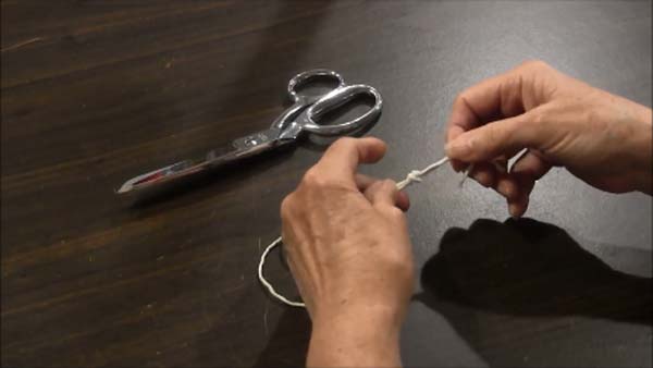 Whirligig Toy - Tie Knot in End