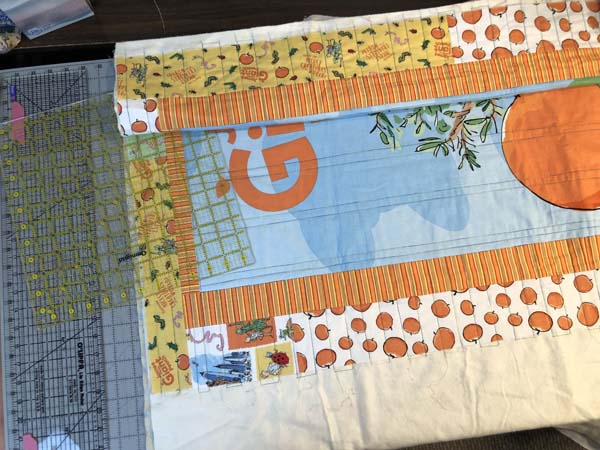 Square up a Quilt Support Quilt On Table