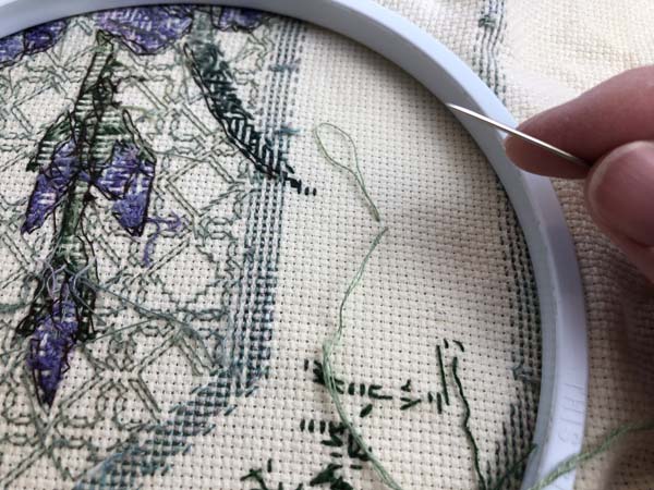 Start Cross Stitch 9 Thread at back and loop