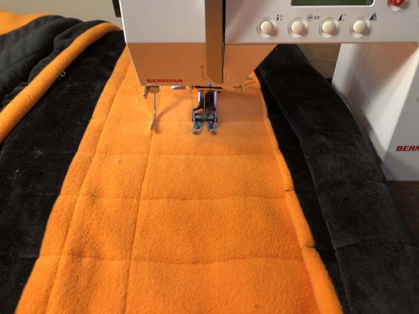 Straight Line Quilting Guide Follows Previously Quilted Line