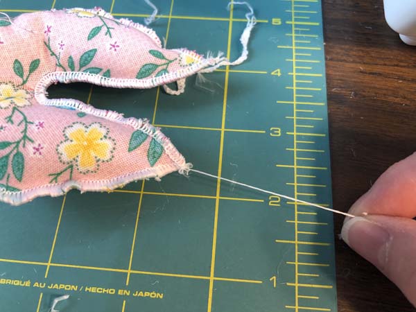 Stuffed Bunny Serger Pull thread to knot