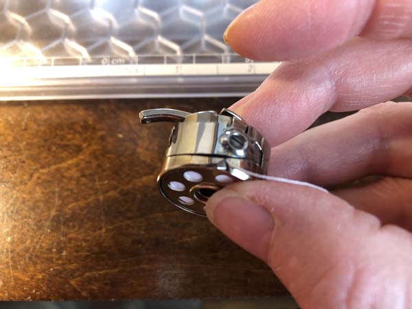 Thread a Bobbin 17 Thread End Through Case
