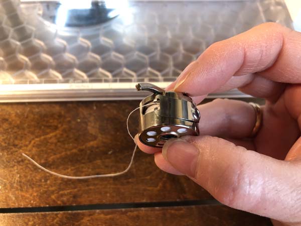 Thread a Bobbin 18 Thread to Left