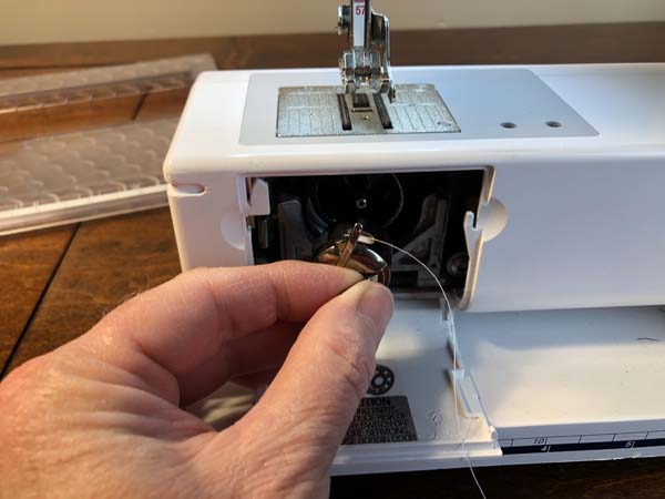 Thread a Bobbin 20 Place In Machine