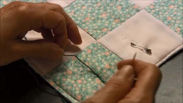 Tie a Quilt pull tight