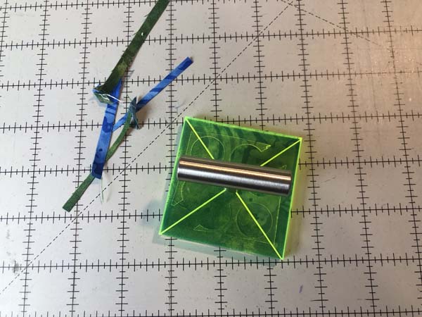 Trim Lock Half square triangle block trimmed