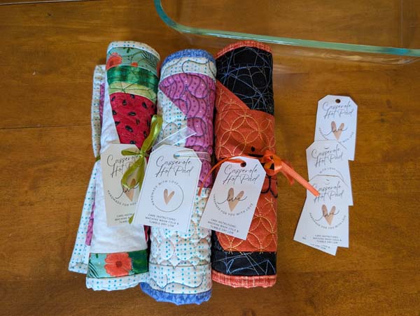 Villa Rosa Casserole Hot Pad Rolled Up with tag