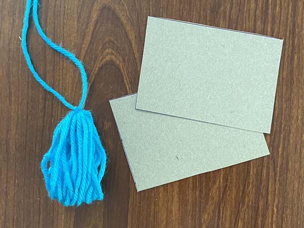 Yarn Tassel 7 Tassel off cardboard
