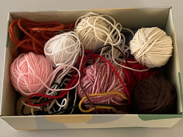 Yarn Unraveling 1 Messy Box of yarn