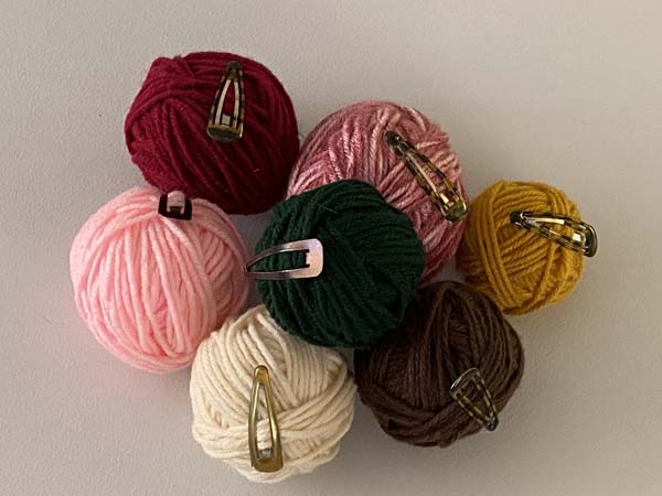 Yarn Unraveling 6 Clips on Yarn Balls