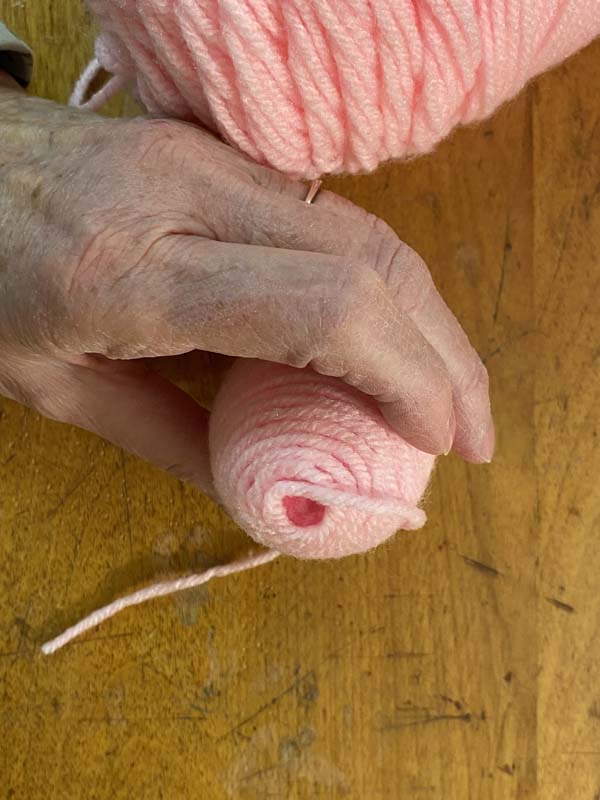 Yarn Wrapped Eggs almost covered